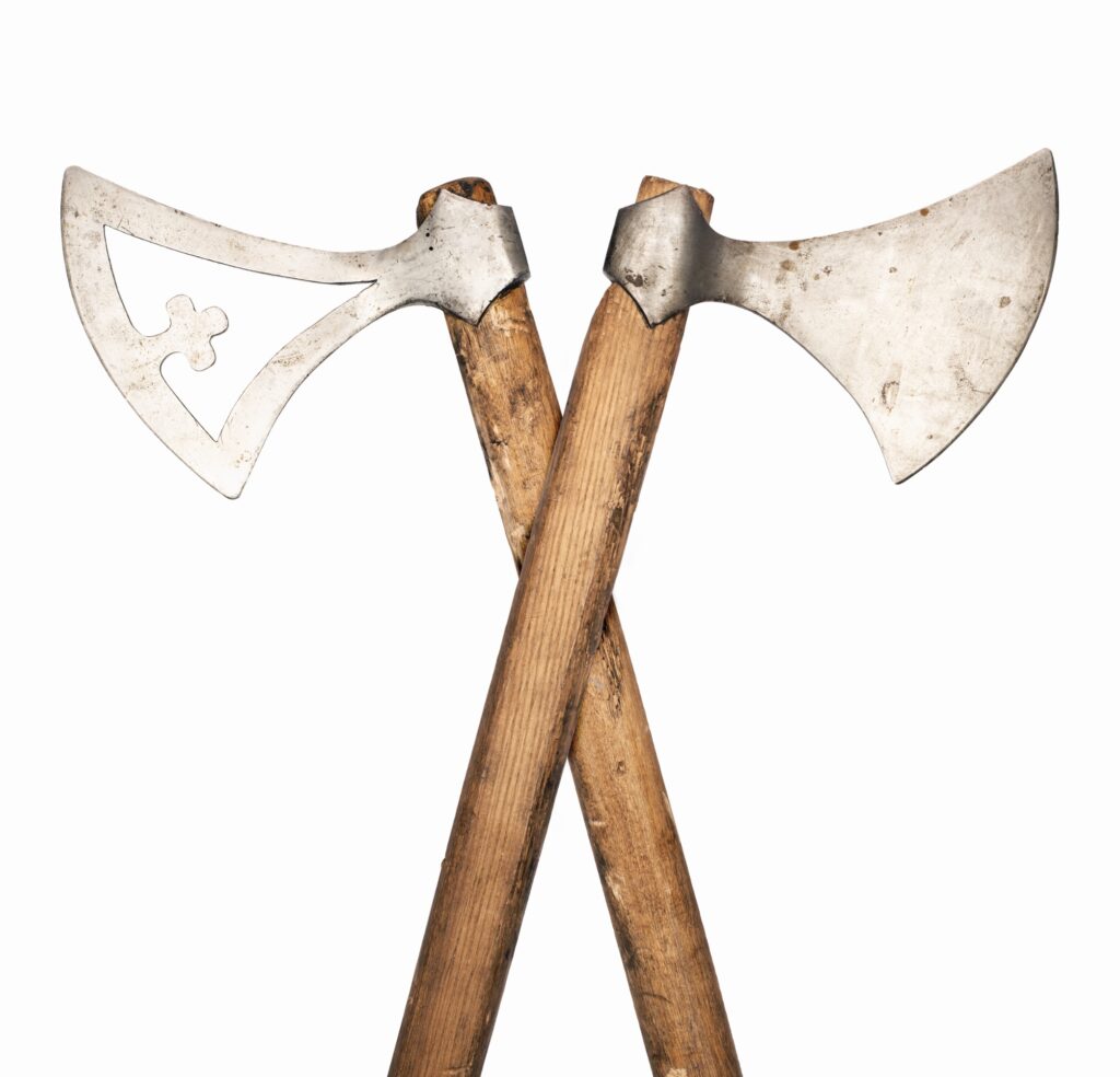Two crossed axes against a white background.